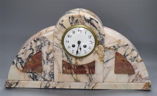 An Art Deco veined marble mantel clock, with two-train movement, height 51cm